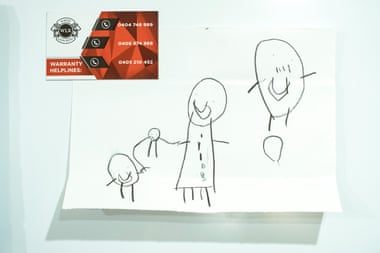 A portrait of the Ramazan family drawn by five-year-old Daniel
