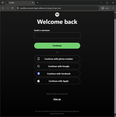 A screenshot of a Spotify login scam site.