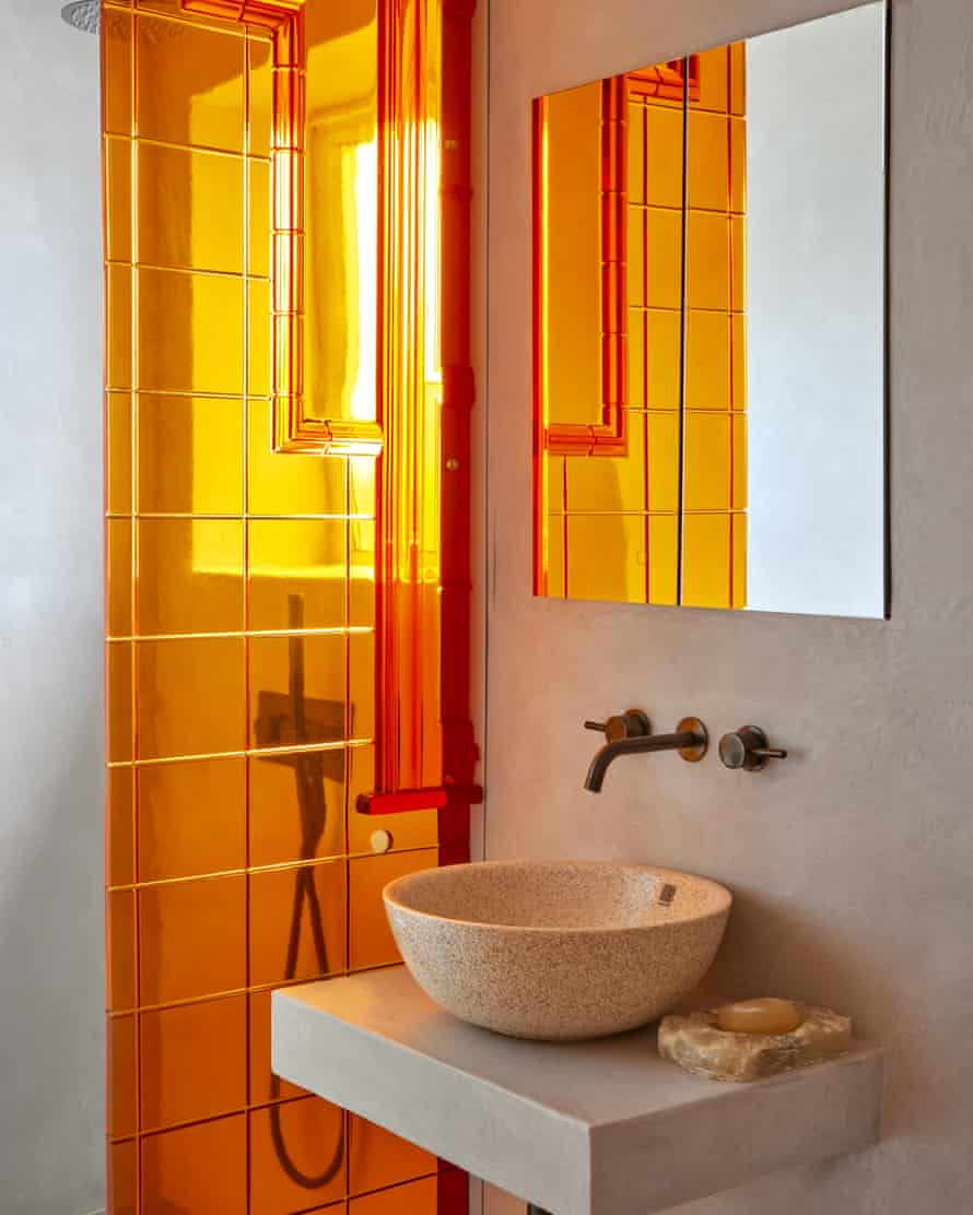 Resin d’être: coloured resin panels in the shower room.