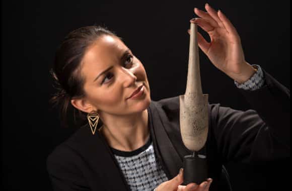 Valuer Lucy Marles with the rediscovered Hans Coper vase.