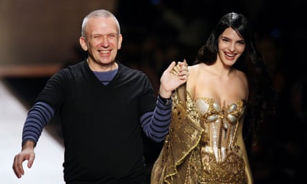 Jean-Paul Gaultier with a catwalk model at his spring/summer 2008 show in Paris.