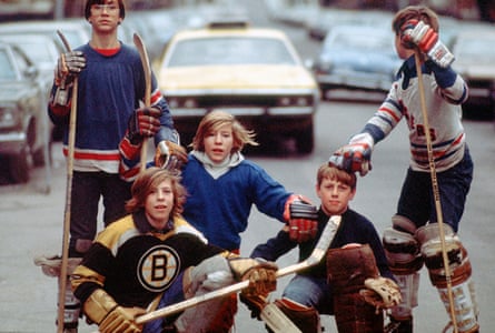 Kids play street hockey in 1976.