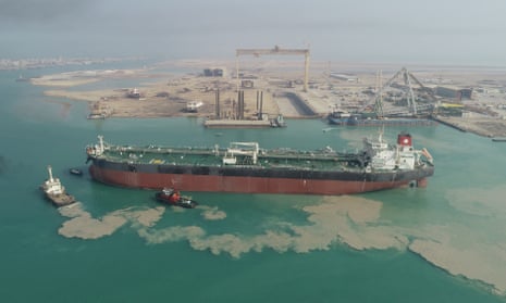 An oil tanker is seen at an Iranian port. The trade in sanctioned oil has boomed over the last year. 