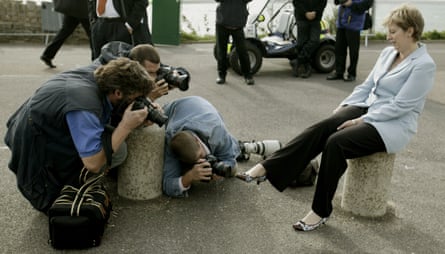 Photographers focus on the shoes on the cliff path at the Conservative party conference in Bournemouth in 2004.