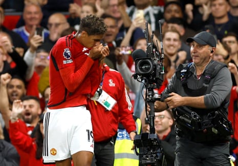 Manchester United's Raphael Varane celebrates scoring their first goal against Wolves.