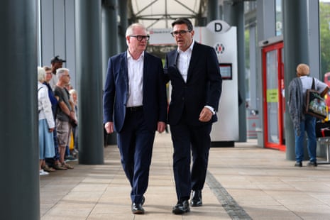 Andy Burnham walks with West Midlands mayor Richard Parker during his visit to Wolverhampton Bus Station.