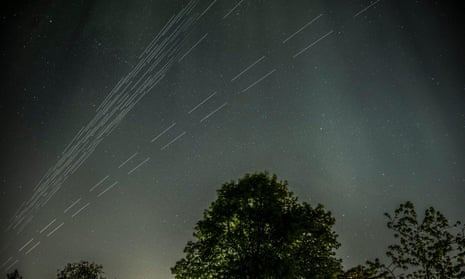 A composite of long exposure images showing Starlink satellites passing over north west London in 2020.