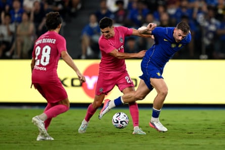 Chelsea’s Liam Delap is tackled by Dejan Petrovic of JDT during a pre-season friendly