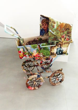 A pram by Swedish designer Ulla-Stina Wikander, who covers 1970s household objects in second-hand cross-stitches