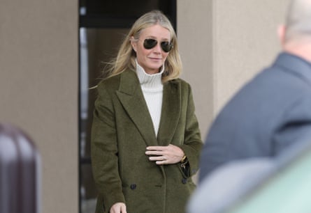 Gwyneth Paltrow wears a khaki tailored jacket and aviator sunglasses