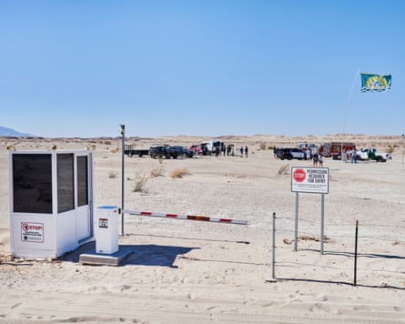 desert scene with a booth and barrier
