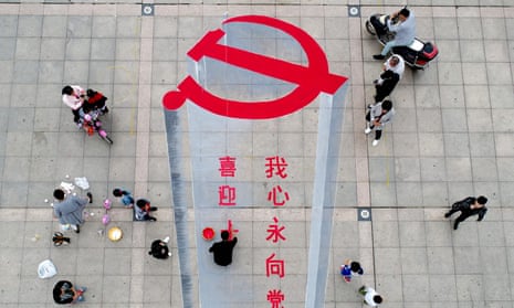 A 3D street painting of the emblem of Chinese Communist Party to celebrate the upcoming Party Congress.
