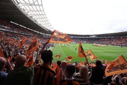 Hull City fans wave flags before their opening game of the season.