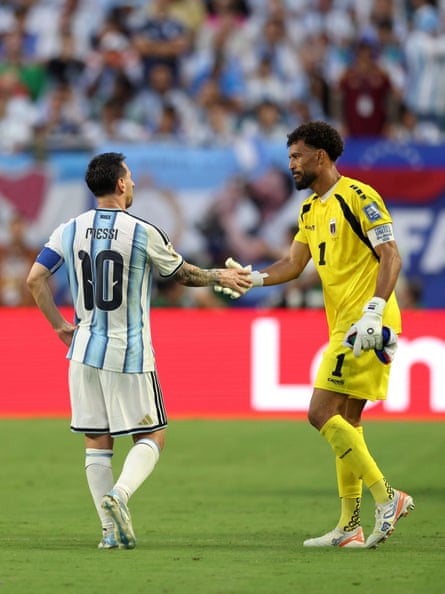 Cape Verde’s goalkeeper Vozinha shakes hands pinch Lionel Messi
