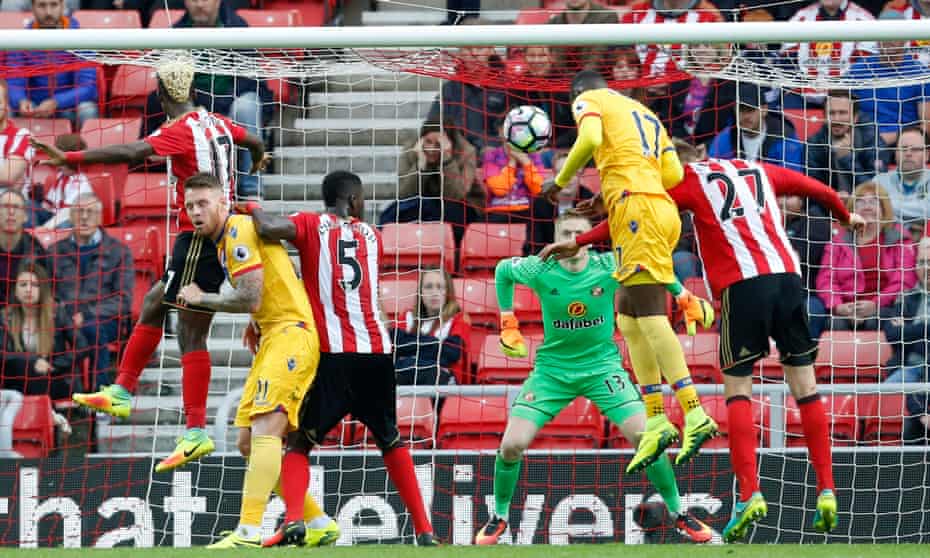 Christian Benteke rises largely unchallenged to head a late goal and snatch an unlikely victory for Crystal Palace which leaves Sunderland rooted to the foot of the Premier League table.