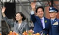 Taiwan's President Lai Ching-te (R) waves alongside outgoing president Tsai Ing-wen during the inauguration ceremony at the Presidential Office Building in Taipei on 20 May 2024.