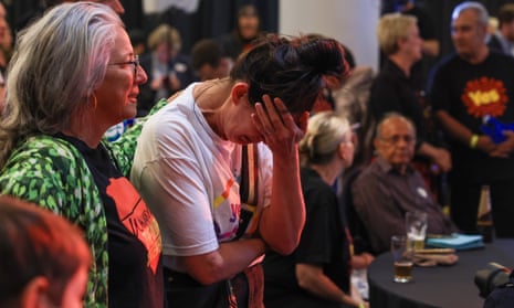 Yes supporters react to the result of the Indigenous voice to parliament vote, Sydney, Australia, 14 October.