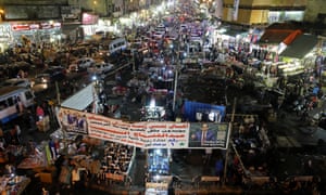 People shop at a Cairo market