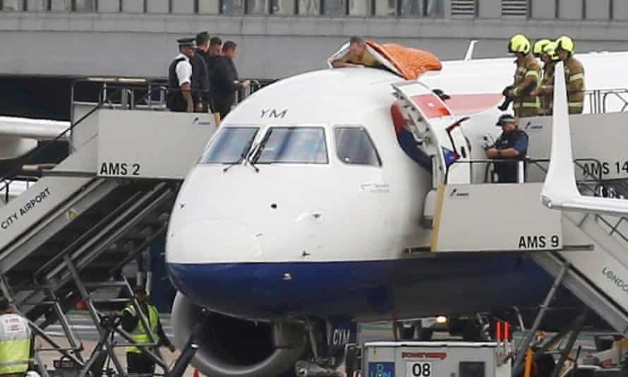 James Brown on top of a plane in October 2019 during a protest at London City airport.