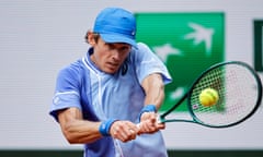 Alex de Minaur plays a shot on the way to beating Daniil Medvedev in the round of 16 match at the 2024 French Open at Roland Garros