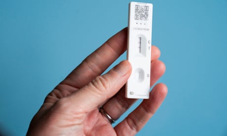 A Covid-19 rapid antigen test (lateral flow self test) showing a positive result.