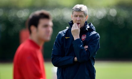 Arsène Wenger and Cesc Fàbregas at training.