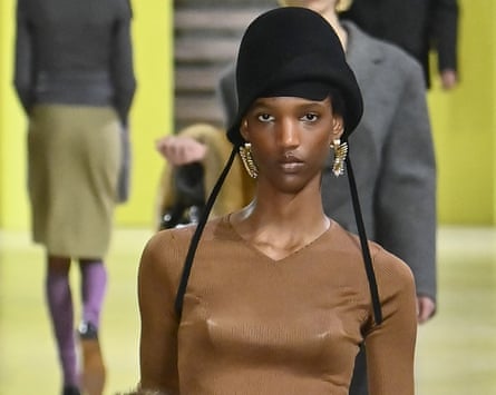 A model on the Miu Miu catwalk, Fall/Winter 2025-2026 Paris Fashion Week, March 2025