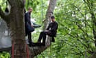 Paris protesters celebrate saving trees around the Eiffel Tower