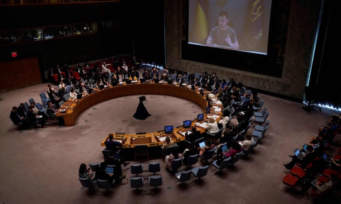 Ukrainian President Volodymyr Zelenskiy appears on screen as he addresses the UN Security Council.