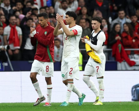 Morocco’s Achraf Hakimi, Azzedine Ounahi and Chemsdine Talbi applaud fans after facing Ecuador
