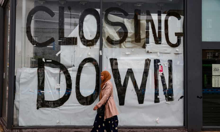 Shop with 'closing down' written in window
