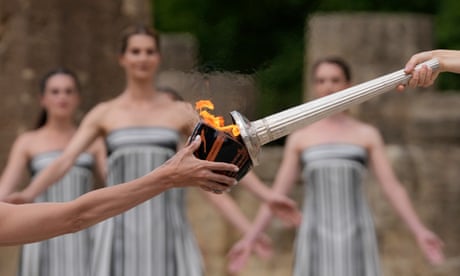 ‘A message of peace’: Olympic flame begins its journey to Paris