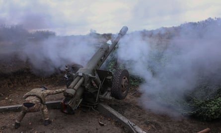 A member of the Ukraine’s national guard fires towards Russian troops in Kharkiv region on Wednesday.