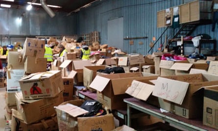 Cambridge students also helped to sort through clothes donated to refugees in a Calais warehouse.