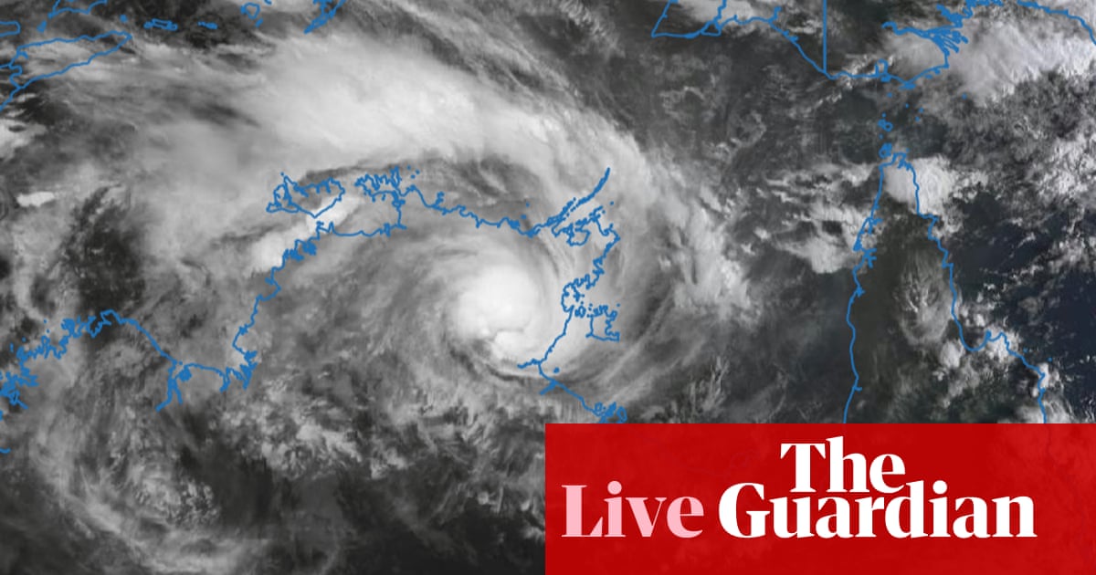 Australia news live: Tropical Cyclone Narelle crosses NT coast as category three system