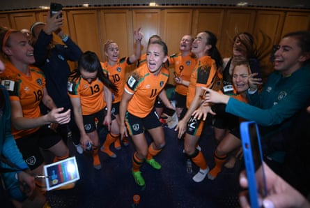 Republic of Ireland players celebrate in the dressing room after their World Cup playoff win over Scotland