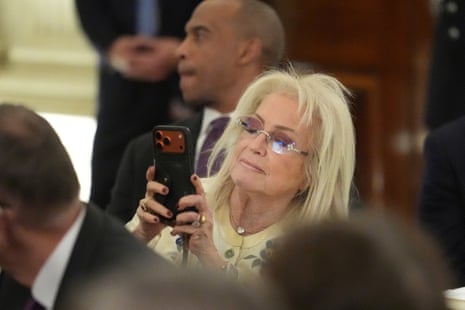 Miriam Adelson took a photo as Donald Trump spoke at a dinner for Japan’s prime Minister, Sanae Takaichi, in the White House State Dining Roomon Thursday.