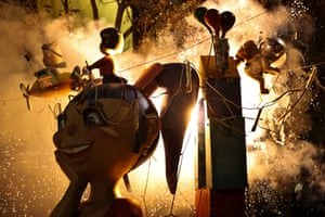 Cardboard figurines burn on the last night of the Fallas festival in Valencia