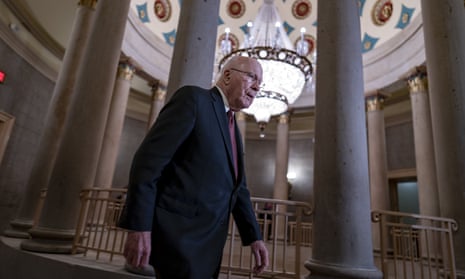 Patrick Leahy returns to his office as negotiations continue on the government spending package on Monday.