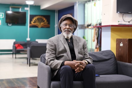 George Campbell sat in a sofa at the night shelter premises where he lives for now