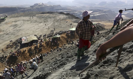 Miners search for jade stones at a Hpakant jade mine in Kachin state, Myanmar