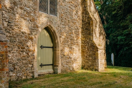 The footpath through wheat fields leads to the back of St Eanswith’s church in Brenzett