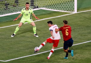 Poland’s Robert Lewandowski shoots at goal.
