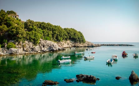Small rocky bay with boats
