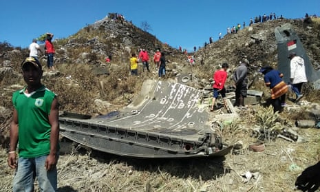 The wreckage of an Indonesian military C-130 plane on a hillside near Wamena