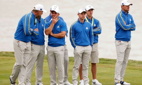 Paul Casey, Rory McIlroy and Bernd Wiesberger watch the action on the 17th hole.