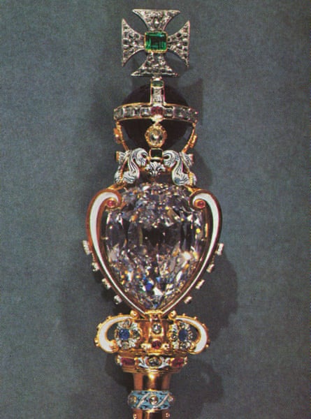 The head of the sceptre with the cross.