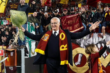 Claudio Ranieri greets Roma supporters.