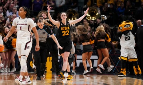Caitlin Clark celebrates after Iowa defeated South Carolina in the NCAA Women’s Tournament semifinals