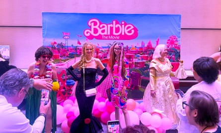 women dressed in barbie outfits